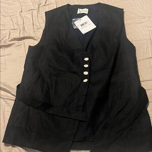 DISSH Black Sleeveless Top with White Buttons